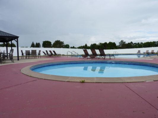 White Vinyl Privacy Fence - Faribault Golf and Country Club Pool